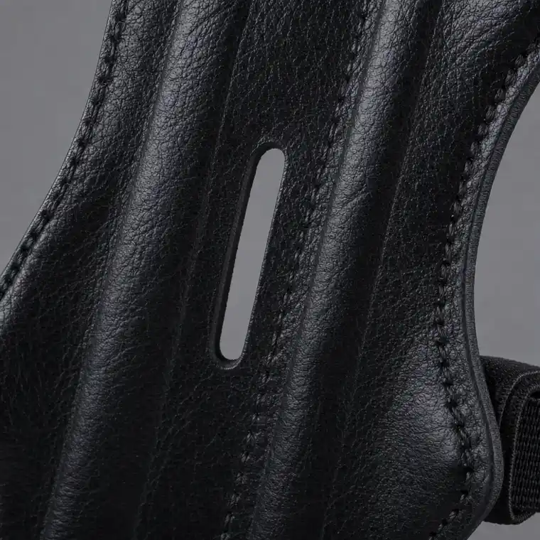 Close-up of the grained PU leather surface of the arm guard